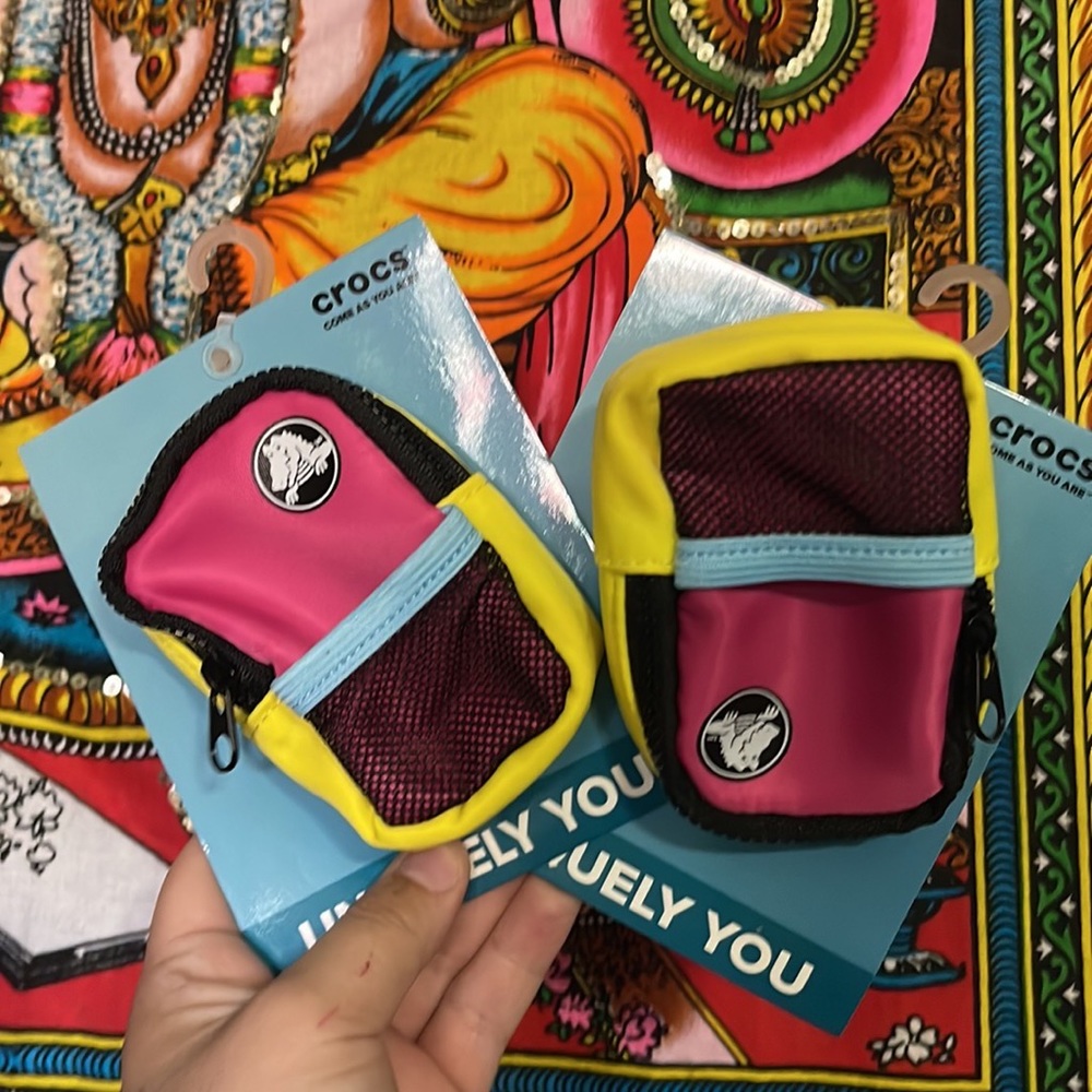 Two crocs pouch charms